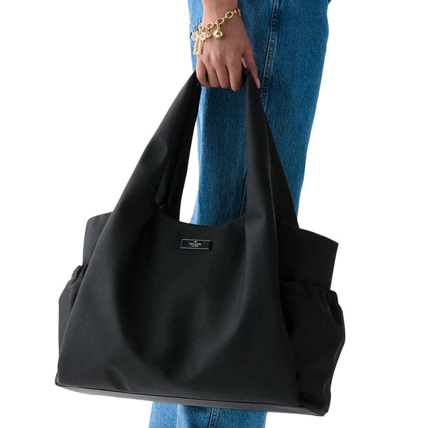 Model Carrying Kate Spade Carter Nylon Large Baby Bag - Black KL960
