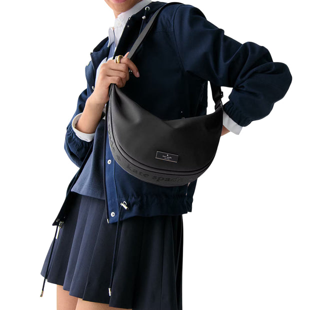 Model Wearing Kate Spade Carter Nylon Medium Sling Bag - Black KL966