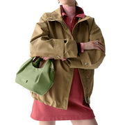 Model Carrying Kate Spade  Carter Nylon Small Pleated Crossbody Bag - Cedar Stand KL965