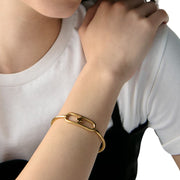 Model Wearing Kate Spade Cut To The Chase Oval Spade Bangle Bracelet - Gold KM177