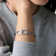 Model Wearing Kate Spade Cut To The Chase Oval Spade Bangle Bracelet - Silver KM177