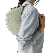 Model Wearing Kate Spade Nova Floral Applique Crescent Shoulder Bag - Sage Bundle KL938