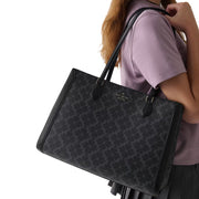 Model Wearing Kate Spade Signature Spade Flower East West Large Laptop Tote Bag - Black KI791
