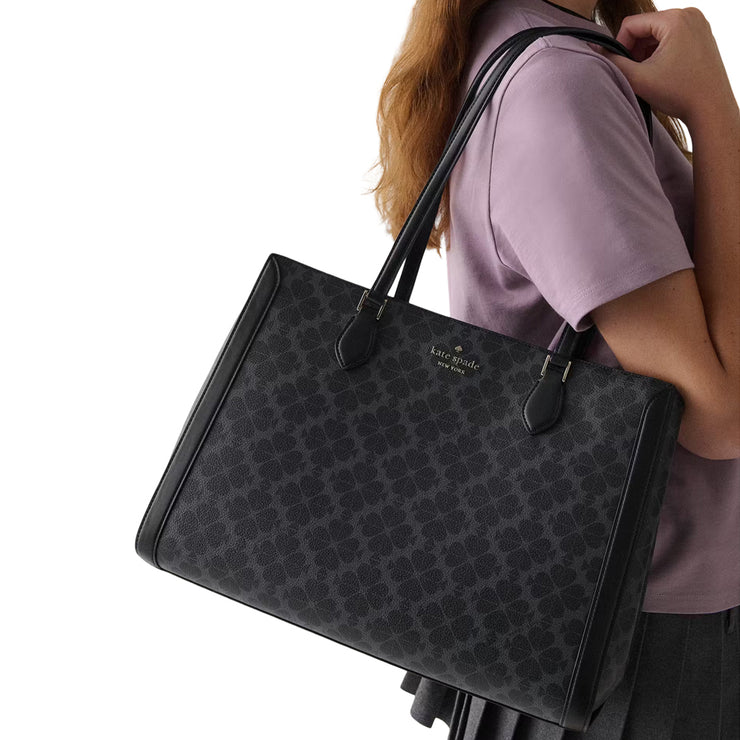 Model Wearing Kate Spade Signature Spade Flower East West Large Laptop Tote Bag - Black KI791