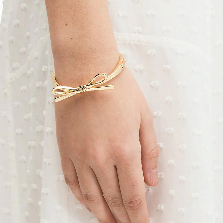 Kate Spade Skinny Mini Bow Bangle Bracelet in Gold o0ru3128