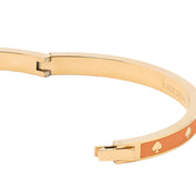 Closeup of Kate Spade Spot the Spade Enamel Hinged Bangle Bracelet - Cayenne Pepper KJ727