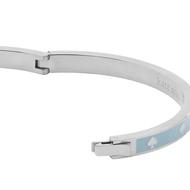 Closeup of Kate Spade Spot the Spade Enamel Hinged Bangle Bracelet - Crisp Sky KJ727