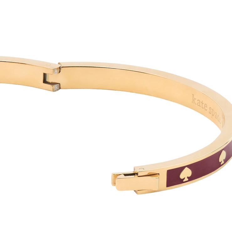 Closeup of Kate Spade Spot the Spade Enamel Hinged Bangle Bracelet - Dark Merlot KJ727