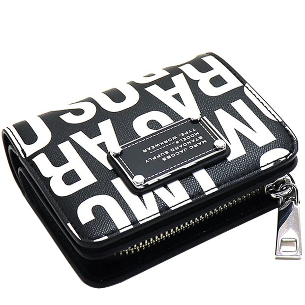 Marc Jacobs Jumbled Logo Trademarc Mini Compact Wallet - Black/ White 4S4SMP009S02 photographed lying flat
