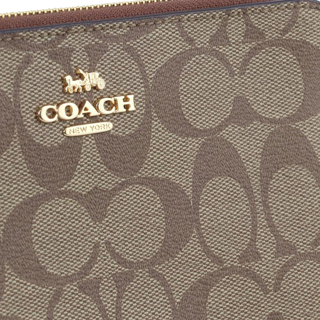 Buy Coach Large Corner Zip Wristlet In Signature Canvas in Khaki