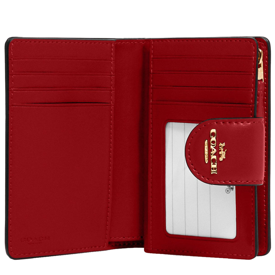 Buy Coach Medium Corner Zip Wallet in Signature Canvas in Gold